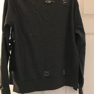 Romeo and Juliet distressed sweater.